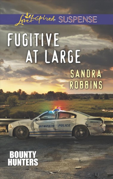 Fugitive at large / Sandra Robbins.